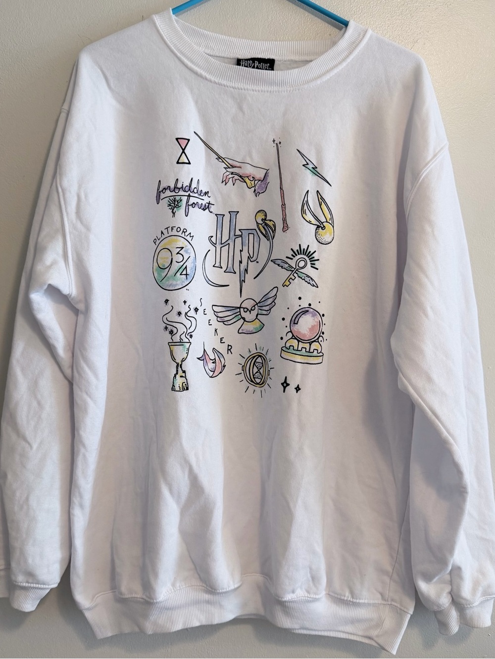 Warner Bros. Harry Potter White Sweatshirt with Black Logo Tag